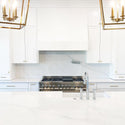 ZLINE Ducted Wall Mount Range Hood Insert in Stainless Steel (695) installed in a custom range hood