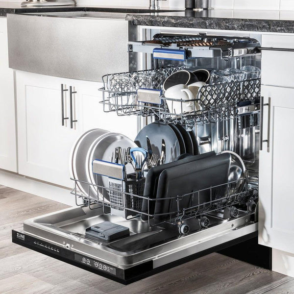 ZLINE Autograph Edition 24 in. 3rd Rack Top Control Tall Tub Dishwasher in Black Stainless Steel with Polished Gold Accent Handle, 51dBa (DWVZ-BS-24-G) in a luxury kitchen from side, open with dishes loaded on all dish racks.
