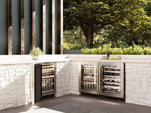 ZLINE Autograph Edition 24 in. Touchstone 151 Can Beverage Fridge With Stainless Steel Glass Door And Polished Gold Handle (RBSOZ-GS-24-G) in an outdoor patio area.