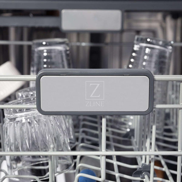 ZLINE 24 in. Monument Series 3rd Rack Top Touch Control Dishwasher with Black Matte Panel, 45dBa (DWMT-BLM-24) close-up, ZLINE logo on dish rack.