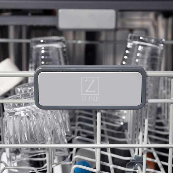 ZLINE Autograph Edition 24 in. 3rd Rack Top Control Tall Tub Dishwasher in Fingerprint Resistant Stainless Steel with Champagne Bronze Accents, 45dBa (DWMTZ-SN-24-CB) close-up, ZLINE logo on dish rack.