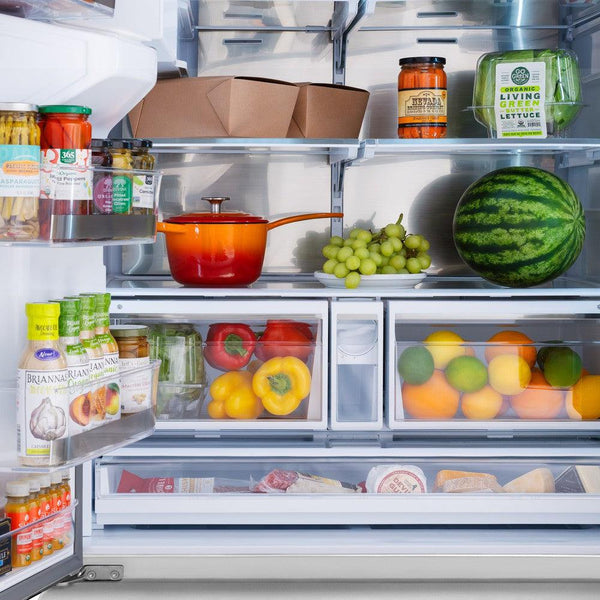 Food on adjustable shelving inside ZLINE 36 in. 28.9 cu. ft. Standard-Depth French Door External Water Dispenser Refrigerator with Dual Ice Maker in Fingerprint Resistant Stainless Steel (RSM-W-36)
