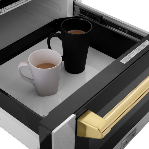ZLINE Autograph Edition 24 in. Microwave in Fingerprint Resistant Stainless Steel with Traditional Handles and Polished Gold Accents (MWDZ-1-SS-H-G) open with two cups of coffee inside.