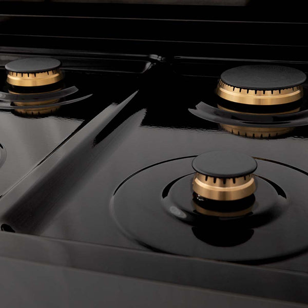 ZLINE brass burners on black porcelain cooktop.