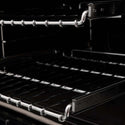 ZLINE Autograph Edition 36 in. 4.6 cu. ft. Dual Fuel Range with Gas Stove and Electric Oven in Black Stainless Steel with Champagne Bronze Accents (RABZ-36-CB) close-up, SmoothGlide ball-bearing adjustable racks inside oven from side.