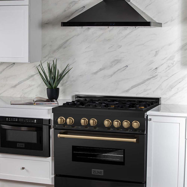 ZLINE Autograph Edition 36 in. 4.6 cu. ft. Dual Fuel Range with Gas Stove and Electric Oven in Black Stainless Steel with Champagne Bronze Accents (RABZ-36-CB) in a luxury cottage-style kitchen with matching microwave and range hood.