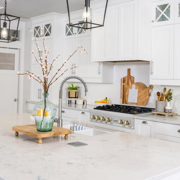 ZLINE Autograph Edition 36 in. Porcelain Rangetop with 6 Gas Burners in DuraSnow® Stainless Steel with Polished Gold Accents (RTSZ-36-G) lifestyle, in a luxury kitchen.