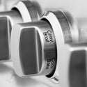 ZLINE 36 in. Dual Fuel Range with Gas Stove and Electric Oven in Stainless Steel with Brass Burners (RA-BR-36) close-up, convection oven control knob.