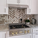 ZLINE Autograph Edition 30 in. Porcelain Rangetop with 4 Gas Burners in Stainless Steel and Polished Gold Accents (RTZ-30-G) lifestyle, in a luxury kitchen.