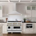 ZLINE Autograph Edition Convertible Stainless Steel Range Hood with Stainless Steel Shell and Champagne Bronze Accents (KB4STZ-CB) in a luxury kitchen with matching range and microwave.