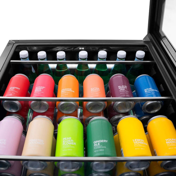 ZLINE beverage center with 3 levels of colorful drinks inside close up from below.
