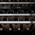 ZLINE Autograph Edition 24 in. Monument Dual Zone 44-Bottle Wine Cooler in Stainless Steel with Matte Black Accents (RWVZ-UD-24-MB) close-up, wine bottles one wooden shelves from below.