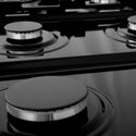 ZLINE burners on black porcelain cooktop with no grates.