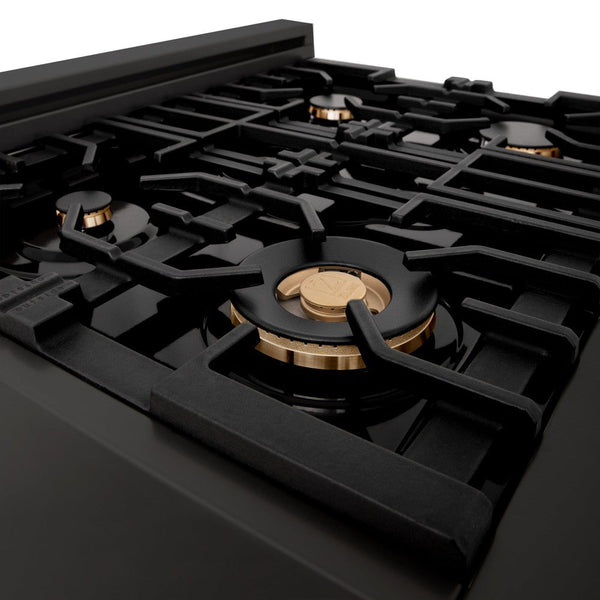 ZLINE brass burners on black porcelain cooktop with cast-iron grates.