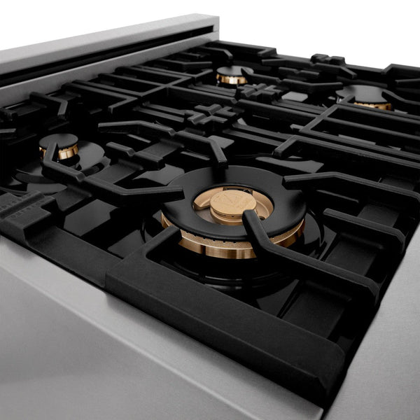 ZLINE brass burners on black porcelain cooktop with cast-iron grates.