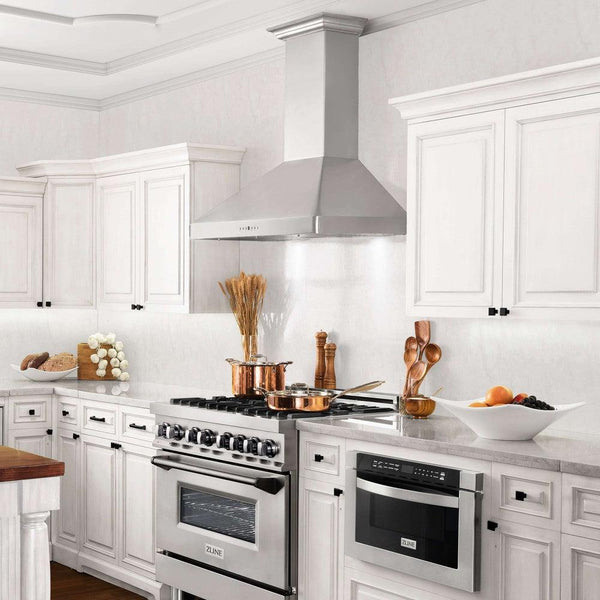 ZLINE 30 in. Wall Mount Range Hood in Stainless Steel with Built-in ZLINE CrownSound Bluetooth Speakers (KF2CRN-BT) in a cottage-style kitchen, side.