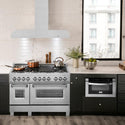 ZLINE KE low-profile wall mount range hood above a large range in modern kitchen
