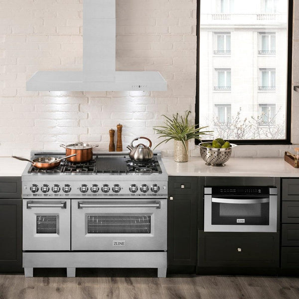 ZLINE KE low-profile wall mount range hood above a large range in modern kitchen