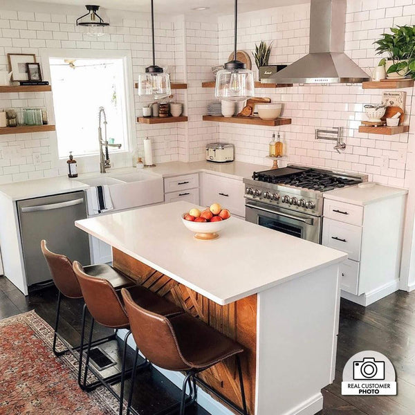 ZLINE Convertible Vent Outdoor Approved Wall Mount Range Hood in Stainless Steel (KB-304) in a compact cottage-style kitchen.