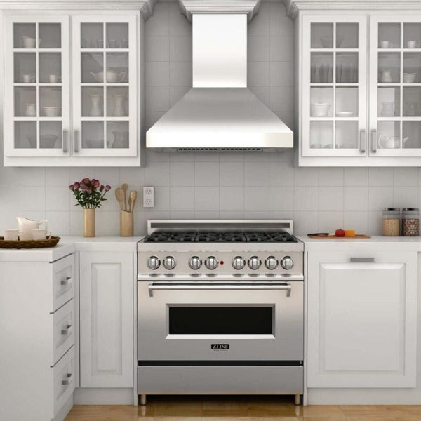 ZLINE Professional Convertible Vent Wall Mount Range Hood in Stainless Steel with Crown Molding (597CRN) in a cottage-style kitchen.